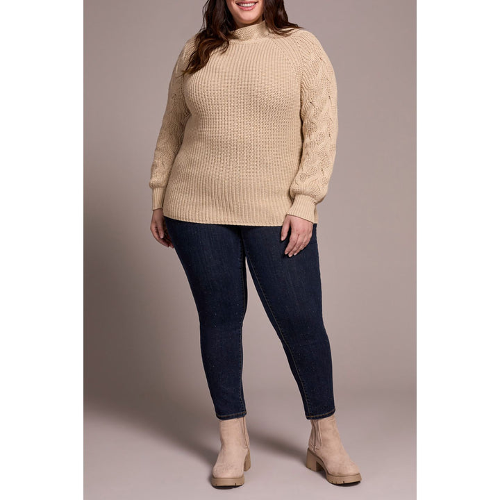 Pull à col montant en maille torsadée