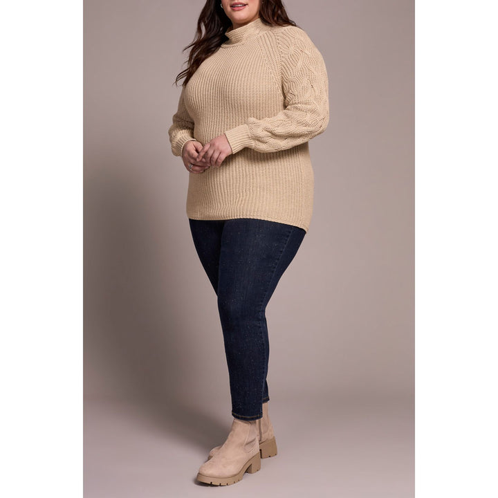 Pull à col montant en maille torsadée