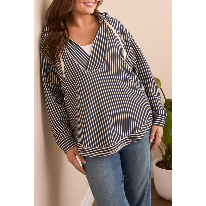 Haut à capuche avec ourlet incurvé