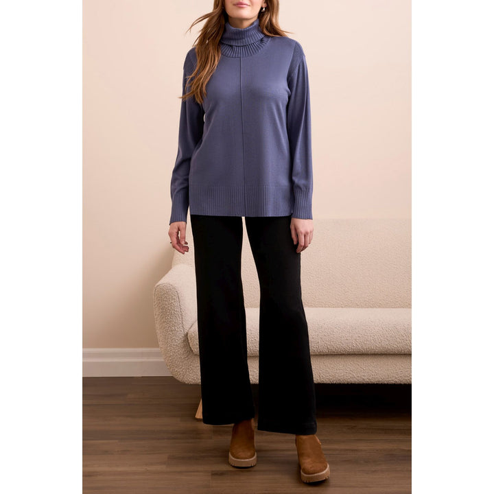 Pull à col roulé et épaules tombantes