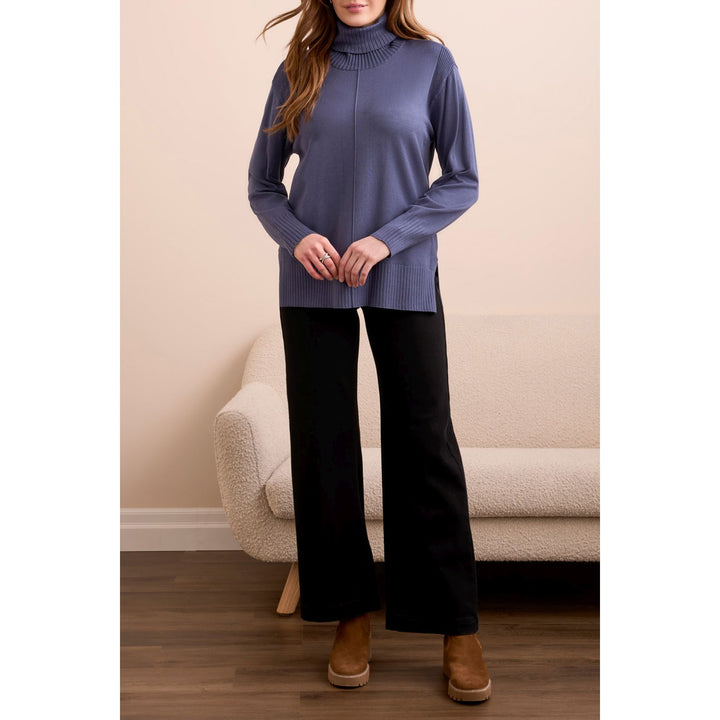 Pull à col roulé et épaules tombantes