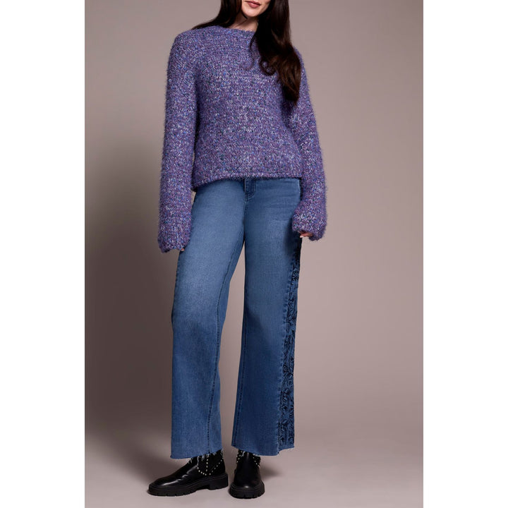 Suéter con mangas abullonadas y hombros caídos con pestañas difusas