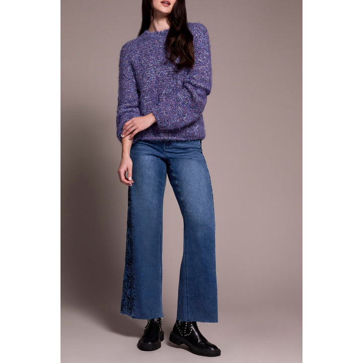 Suéter con mangas abullonadas y hombros caídos con pestañas difusas