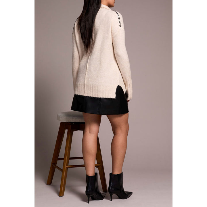 Suéter de cuello alto con intarsia