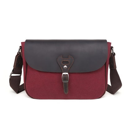 Bolso bandolera de lona con ribete de piel
