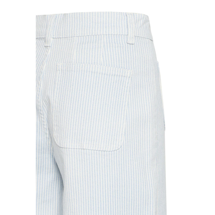 Close-up of a white pants with blue stripes on a white background