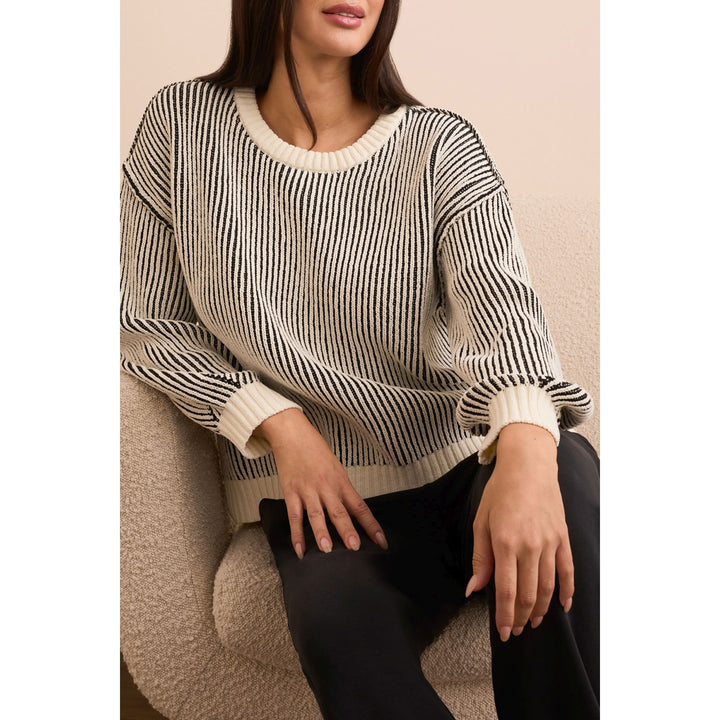 Pull ras du cou avec fente latérale