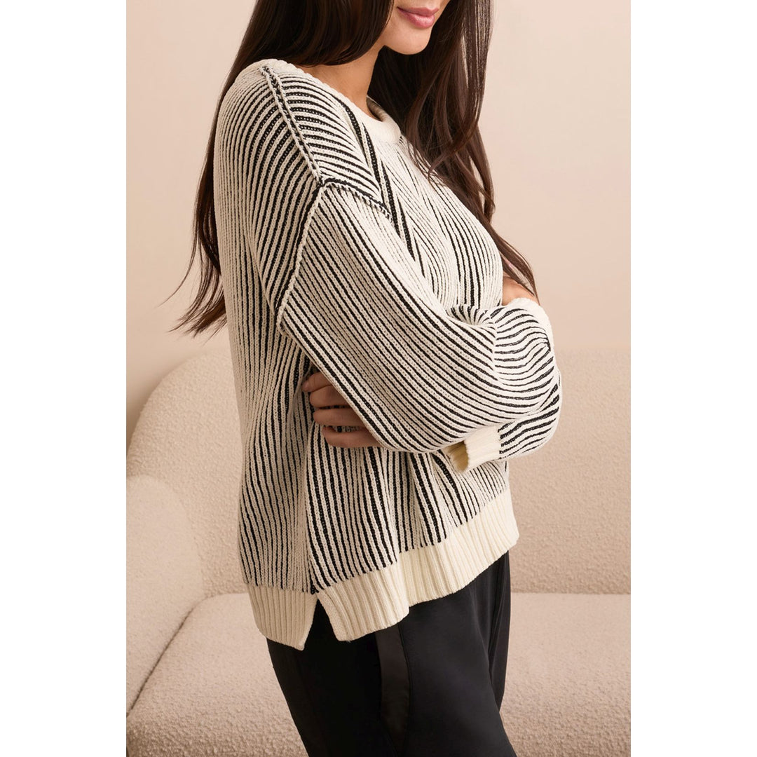 Pull ras du cou avec fente latérale