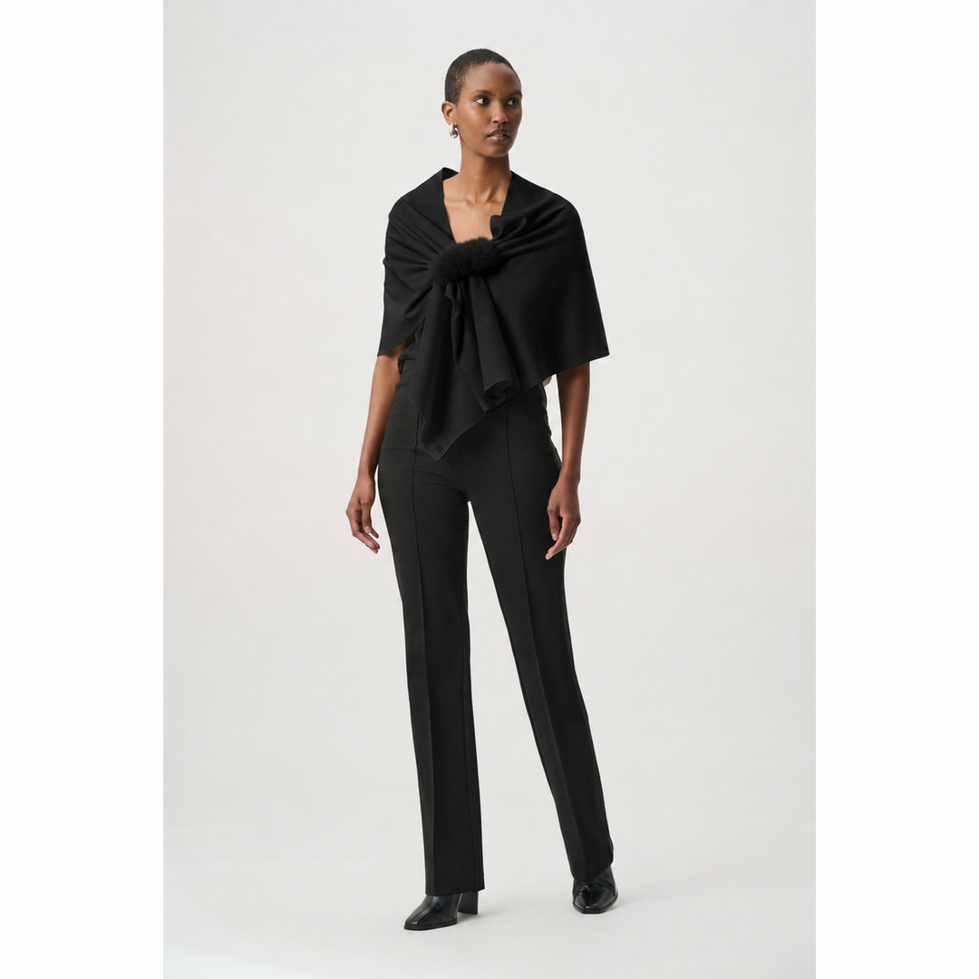 Model wearing Joseph Ribkoff faux fur draped cover-up in black