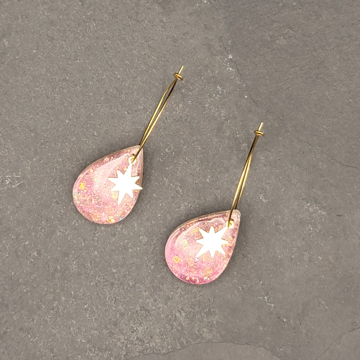 Boucles d'oreilles charmées