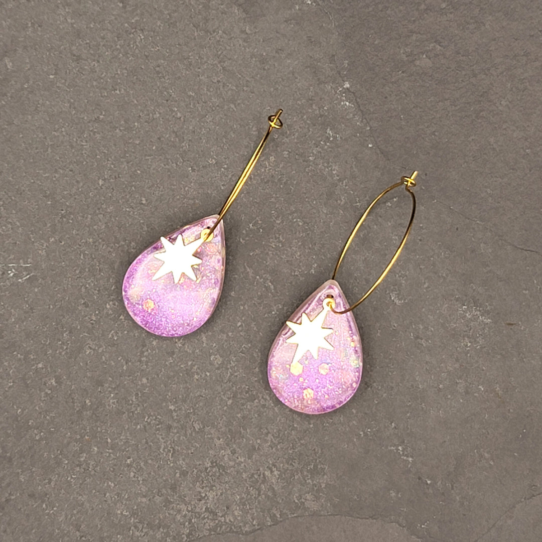 Boucles d'oreilles charmées