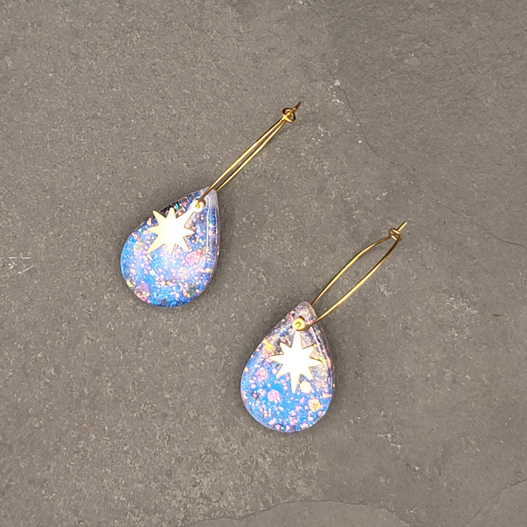 Boucles d'oreilles charmées