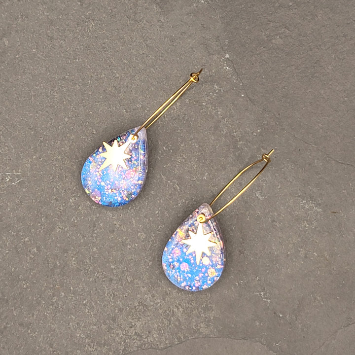 Boucles d'oreilles charmées