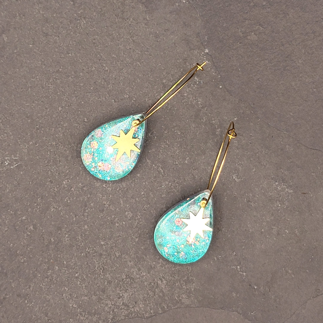 Boucles d'oreilles charmées