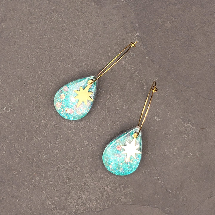 Boucles d'oreilles charmées