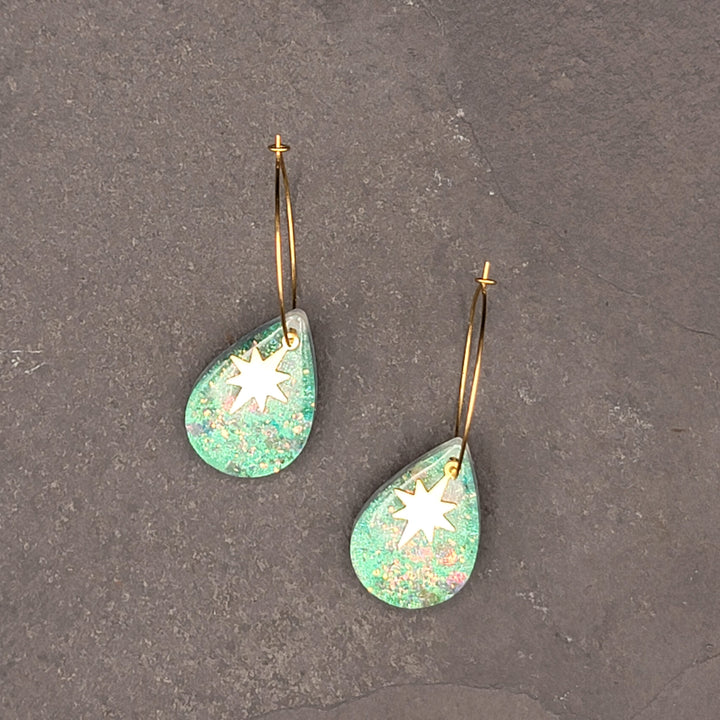 Boucles d'oreilles charmées
