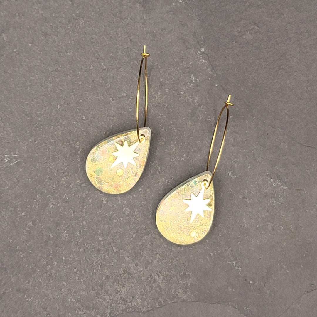 Boucles d'oreilles charmées