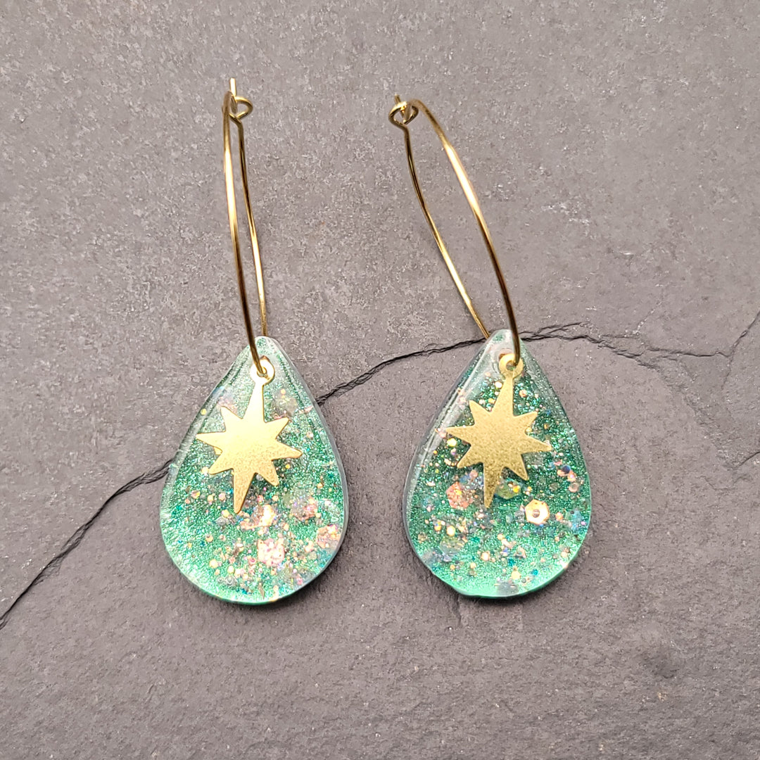 Boucles d'oreilles charmées