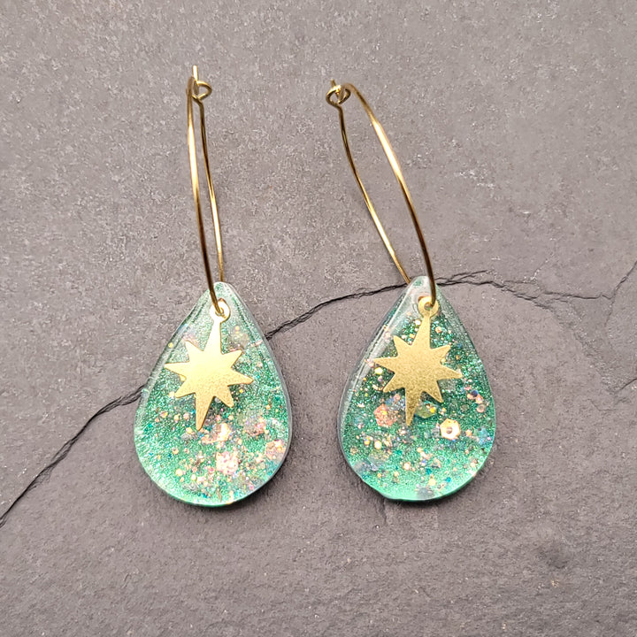 Boucles d'oreilles charmées