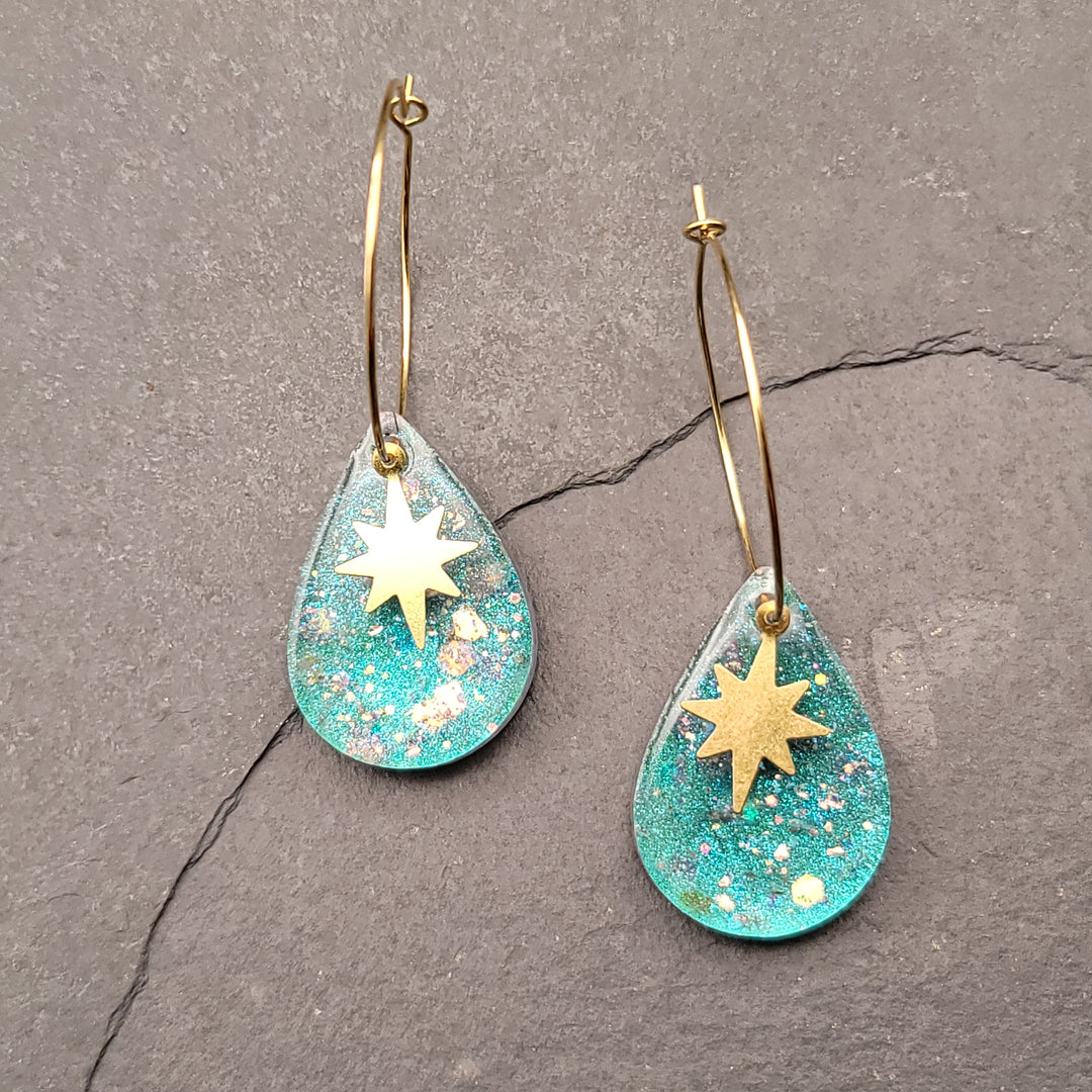 Boucles d'oreilles charmées