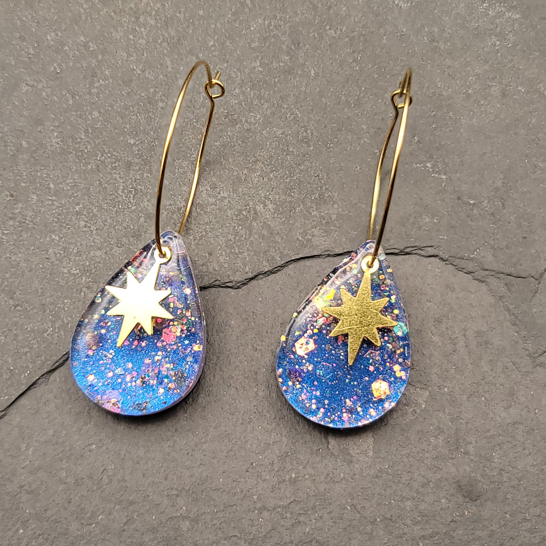 Boucles d'oreilles charmées