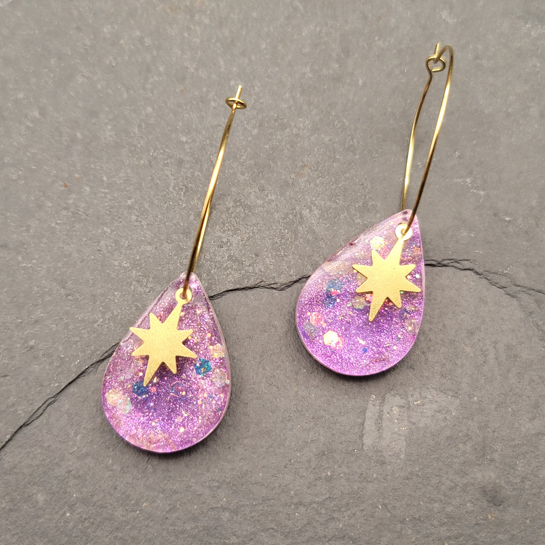 Boucles d'oreilles charmées