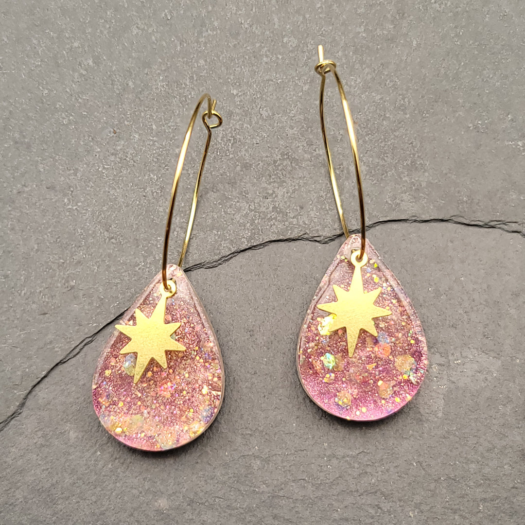 Boucles d'oreilles charmées