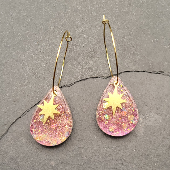 Boucles d'oreilles charmées