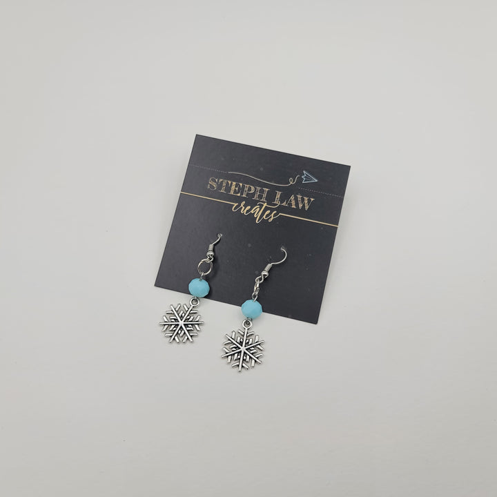Boucle d'oreille flocon de neige en argent